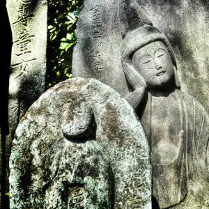 Stone statue relaxing in sunny spot