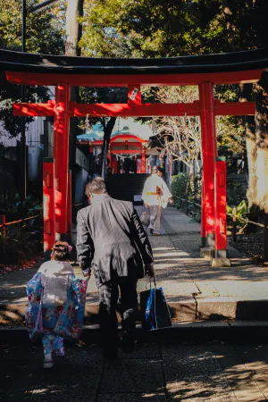 black-tied family in Shinto shrine