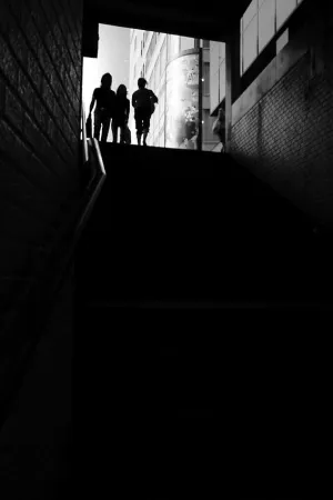 Silhouettes on top of stairway