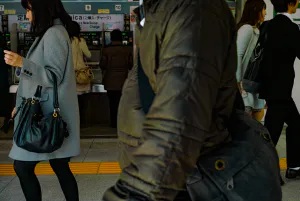 Pedestrians in front of station