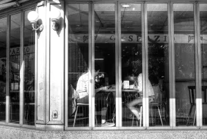 two girls sitting in cafe