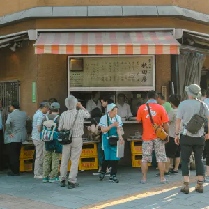 People drinking while standing