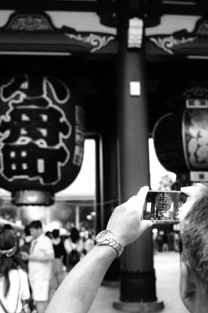 Man taking photo with smartphone