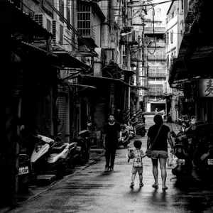 Parent and child in street